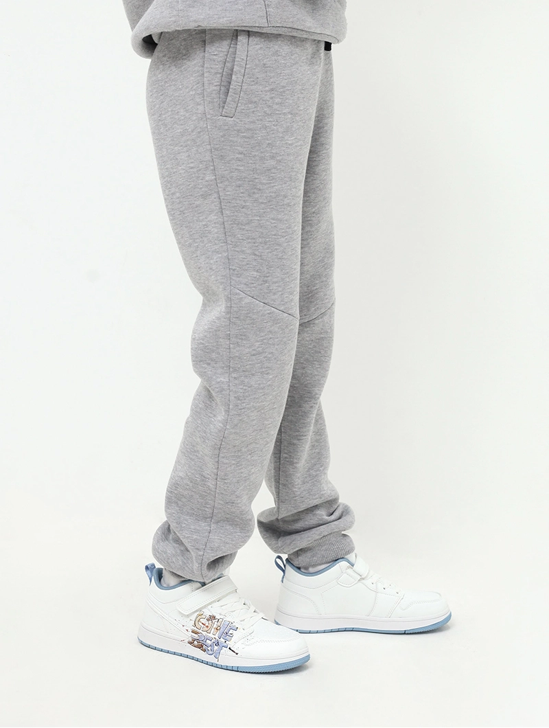 Pantalon jogging bandes côtés